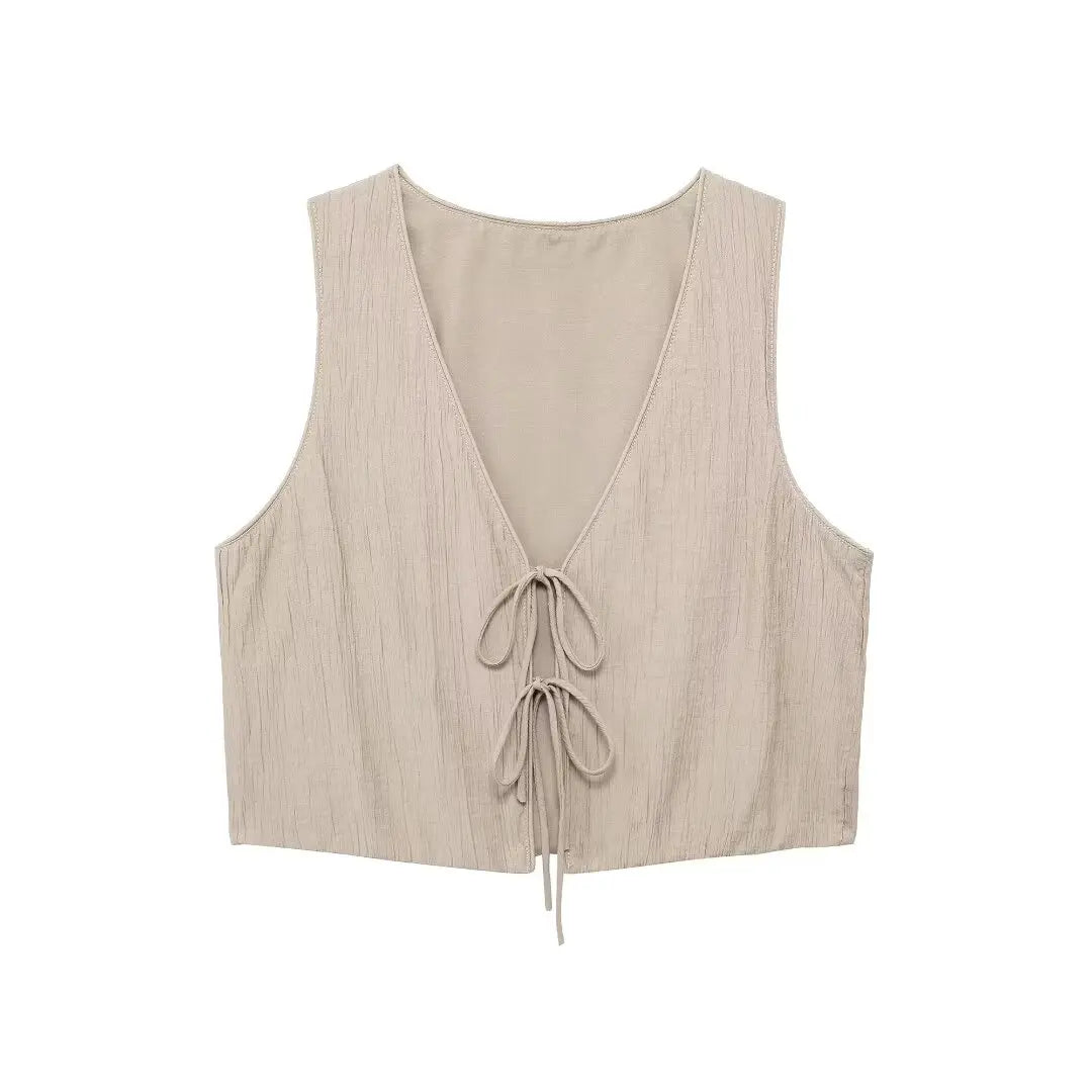 Conjunto de falda y chaleco sin mangas con cuello en V