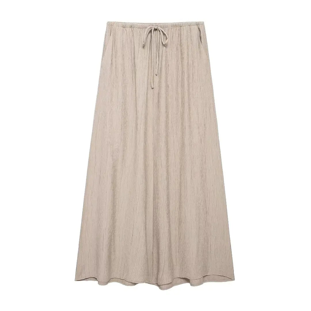 Conjunto de falda y chaleco sin mangas con cuello en V